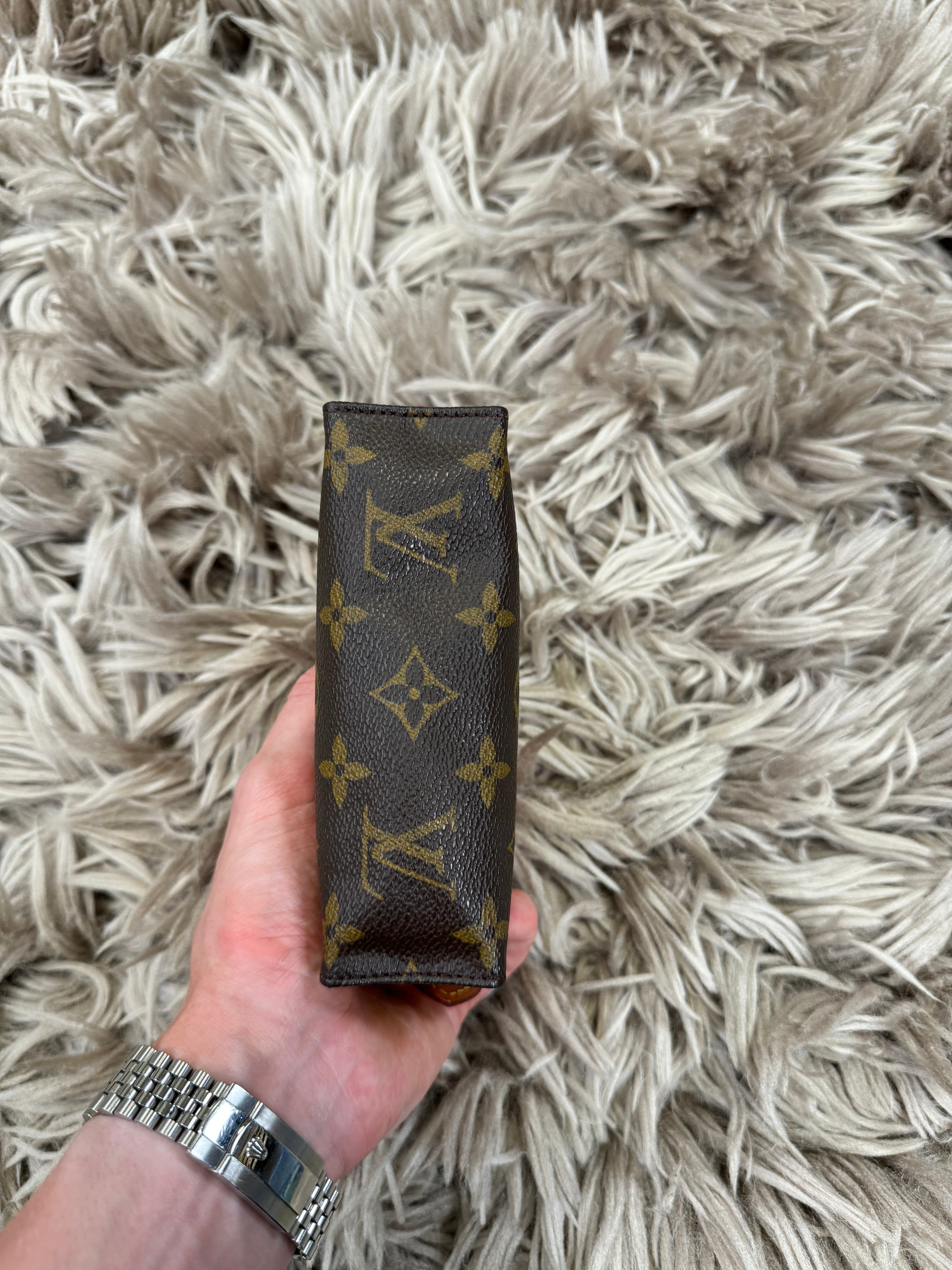 Louis Vuitton mini toiletry bag