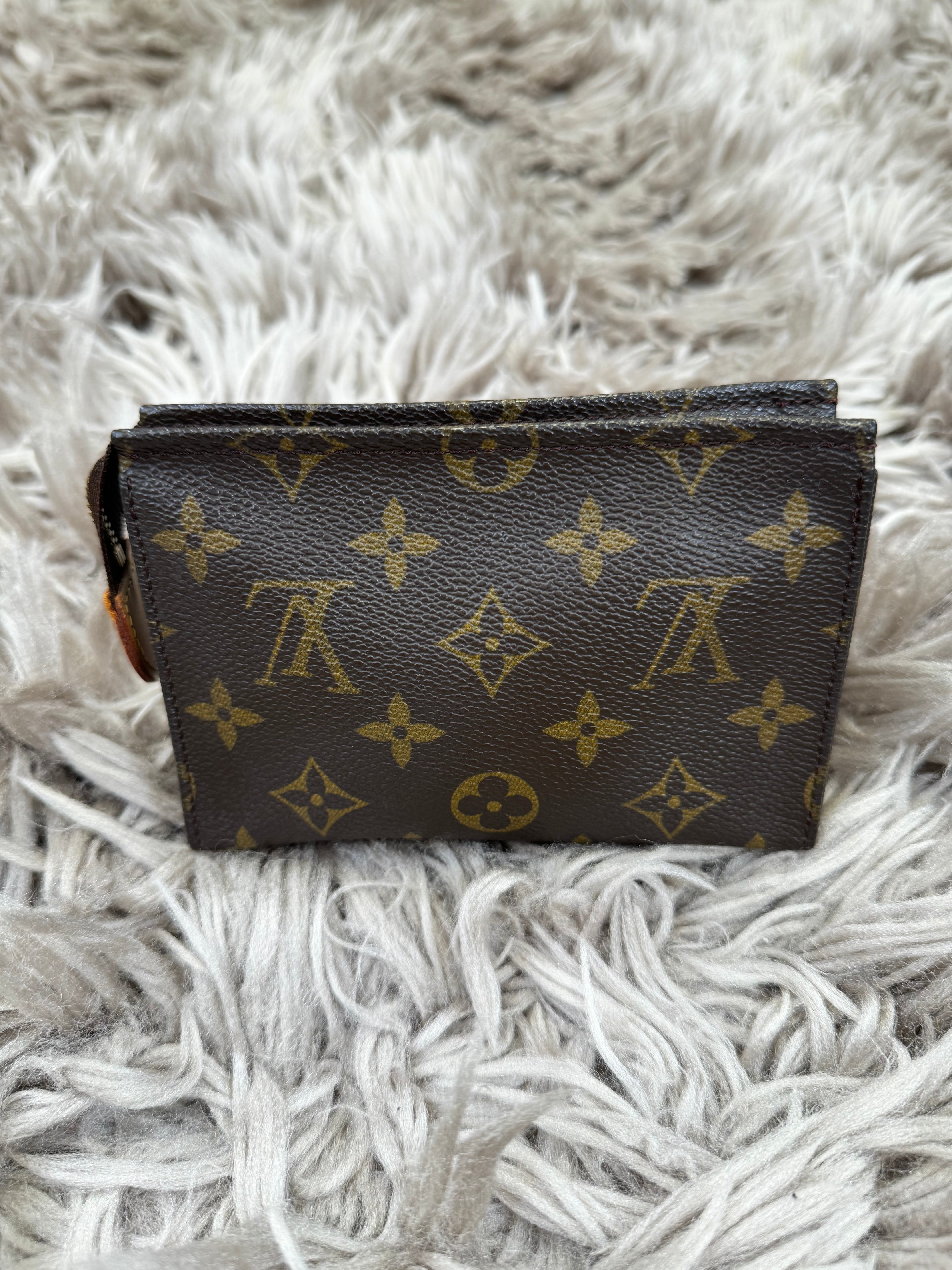 Louis Vuitton mini toiletry bag